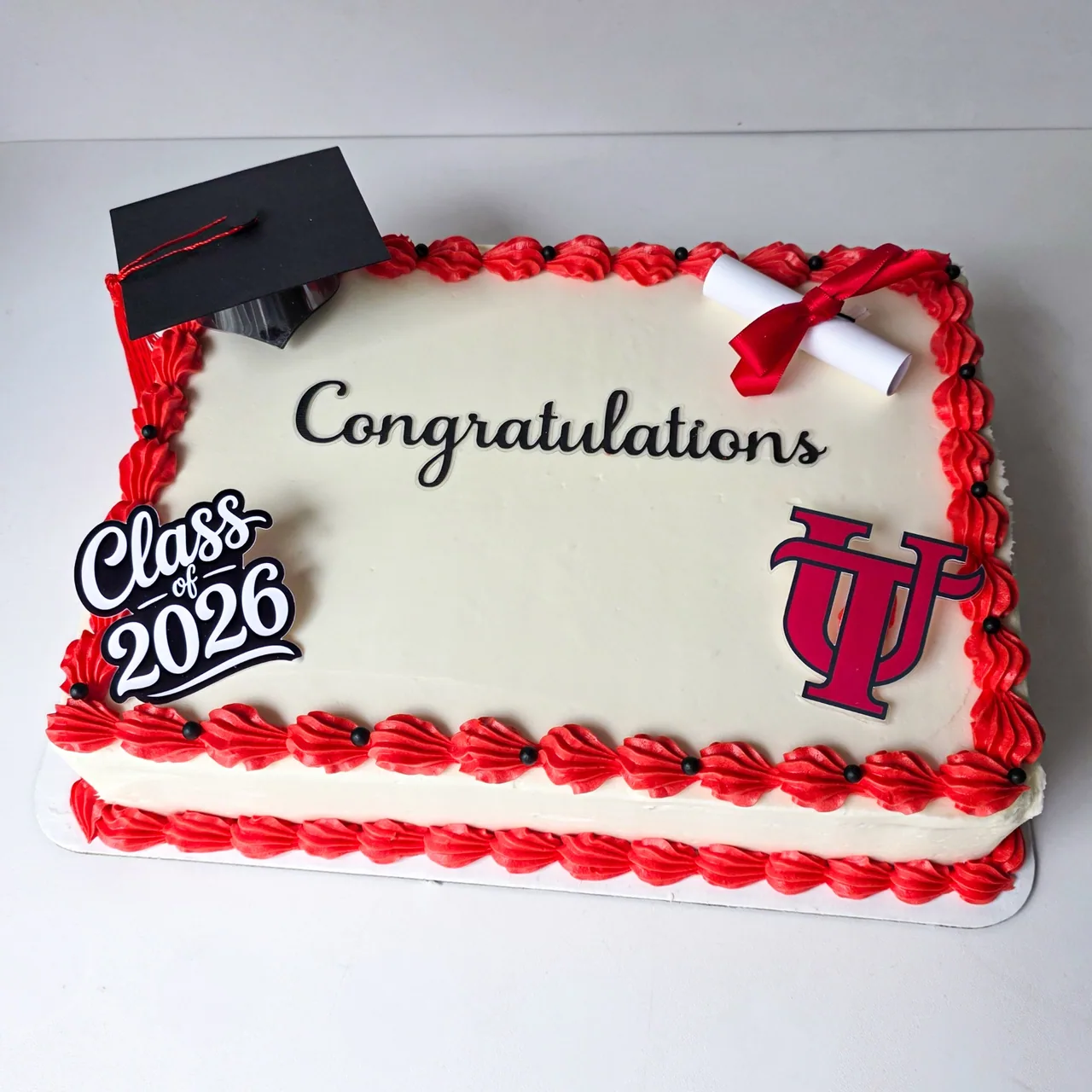 Congratulations graduation sheet cake with red shell border, Class of 2026, and University of Tampa logo
