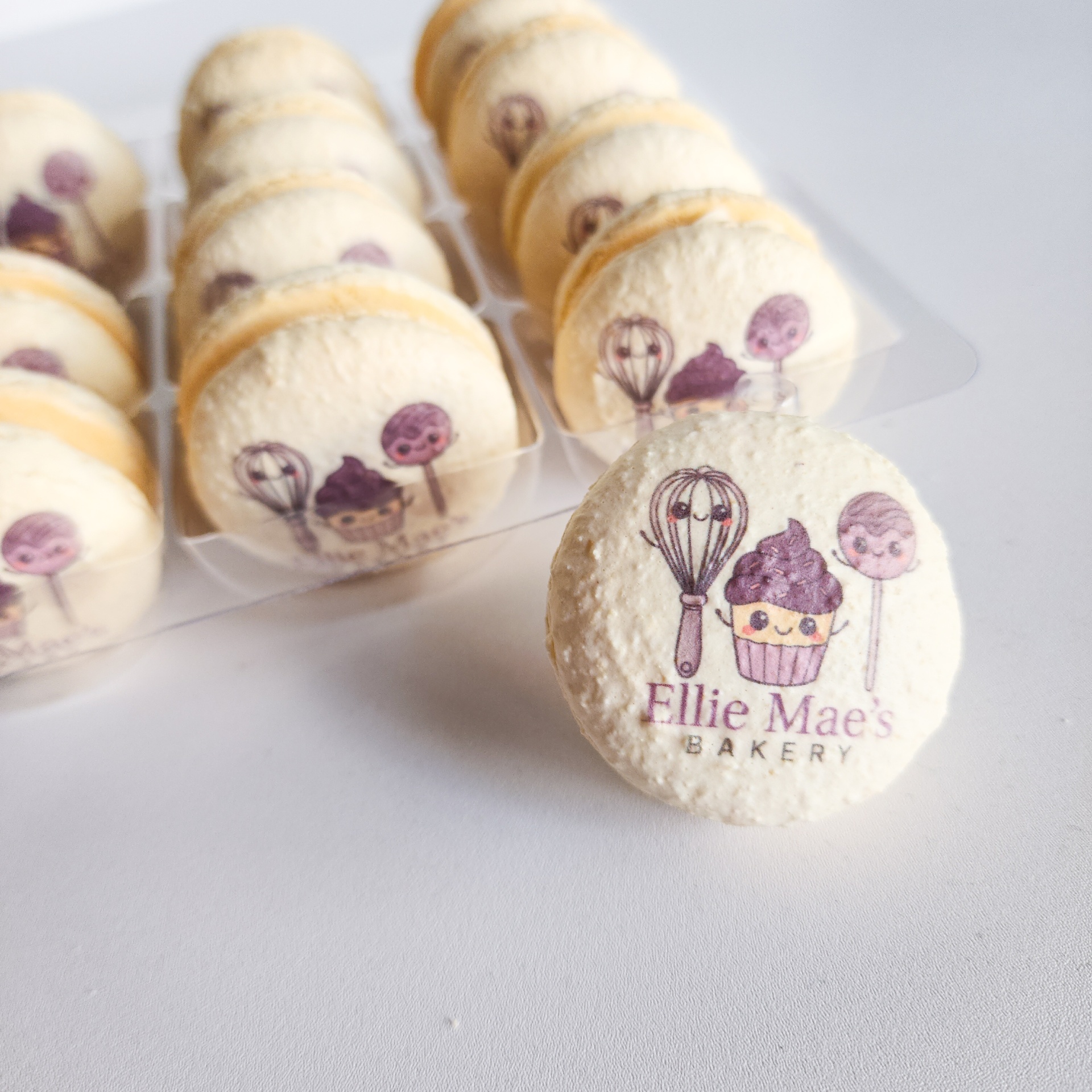 Branded Ellie Mae's Bakery macarons displayed in clear packaging