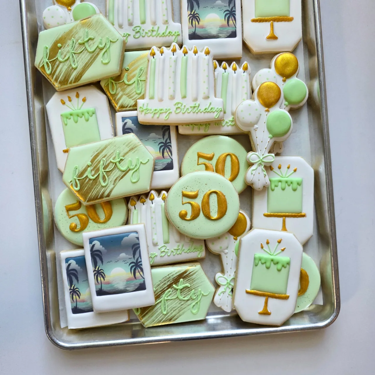 Green and gold 50th birthday decorated cookies